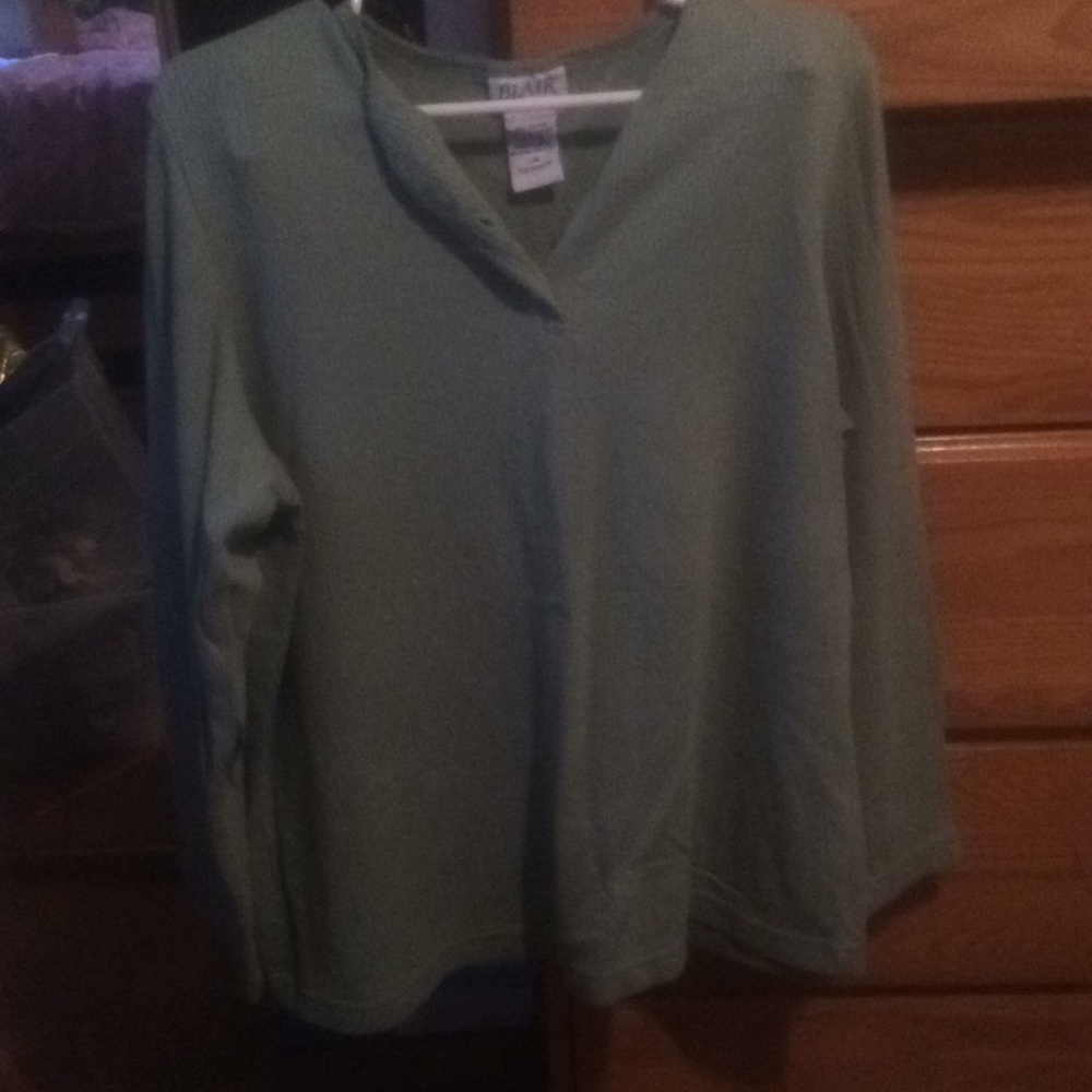 Olive green long sleeve tee.